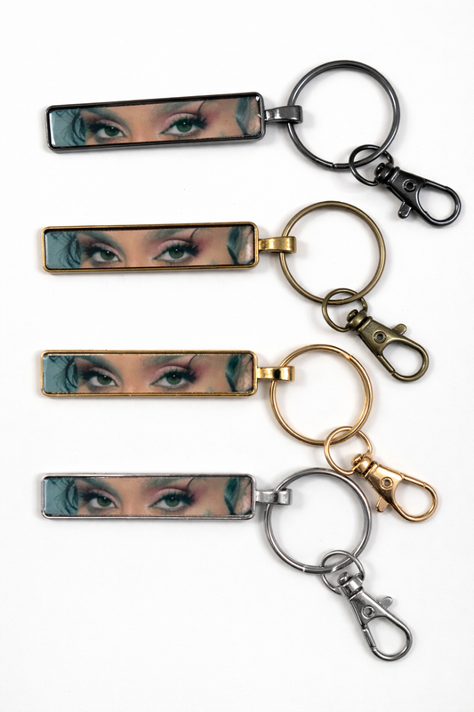 Personalized metal bar keychains with custom photo panels and keyring clasps in multiple finishes